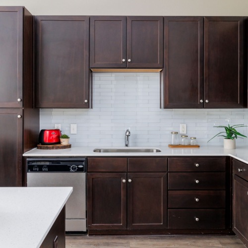 Apartment kitchen with stainless steel appliances