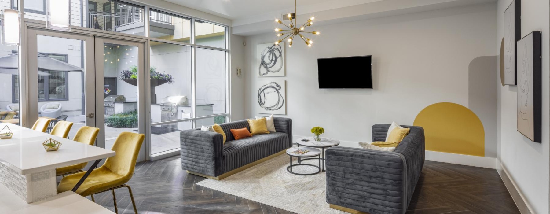 a lounge with a large glass wall