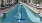 Large sparkling blue swimming pool 
